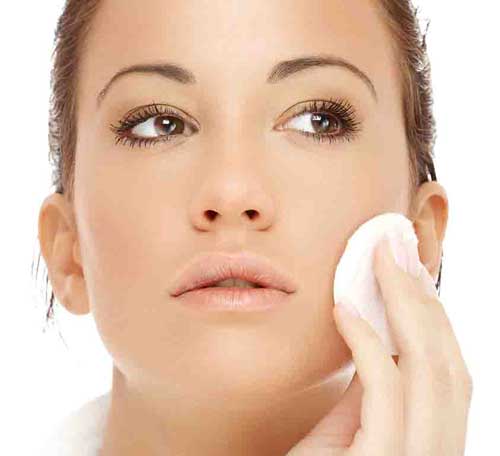 woman-cleaning-face