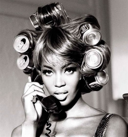 Naomi-Campbell-with-Coca-Cola-rollers-photographed-by-Ellen-von-Unwerth-1991