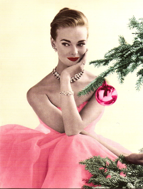 chica rubia con árbol Navidad