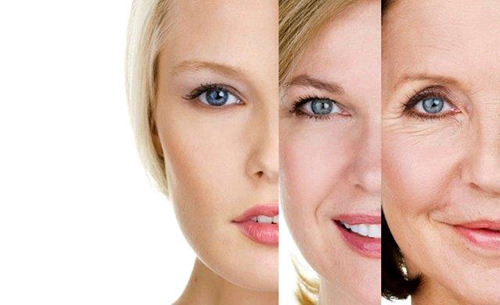 mujer, aparato tratamiento en cara, piel