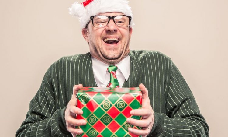 PROD Nerdy Geek Christmas Man Holding Wrapped Holiday Gift