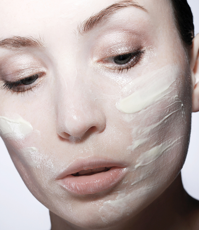 Close Up Photo Of Woman With Face Cream 3686824