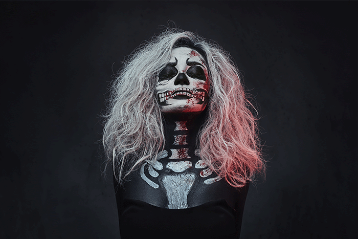 Portrait Of Female With Skull Make Up