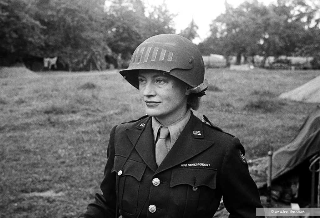 Copyright LeeMillerArchives Lee Miller Wearing Special Helmet Borrowed From U.S Army Photographer Don Sykes (Sergeant) Normandy France 1944