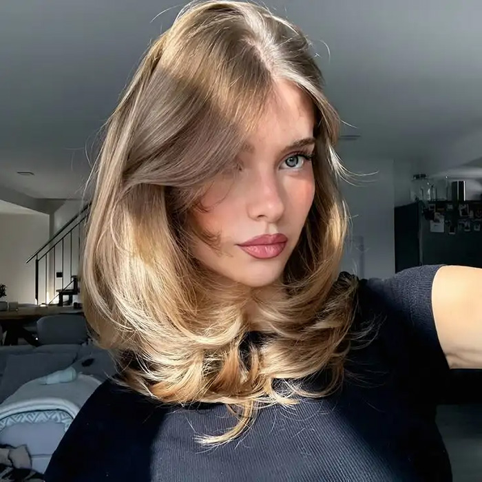 Chica con midi blow out peinados-verano-2026-3